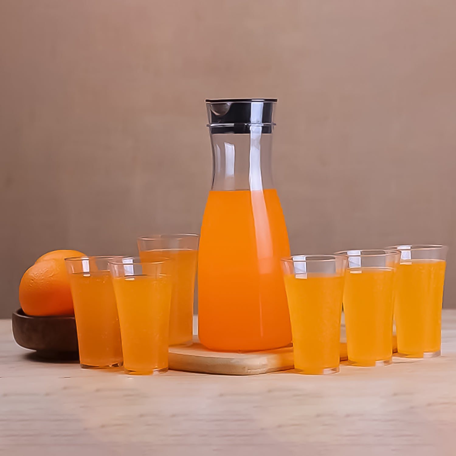 0076_jug_glass_combo.jpg Transparent Unbreakable Water Juicy Jug and 6 Pcs. Glass Combo Set - Front View by Nari Haat, Indian ethnic wear, wom...