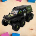Big Military 8-Wheel Plastic Car Toy (1 Pc) - Neckline Detail by Nari Haat, Indian ethnic wear, women clothing, desig...