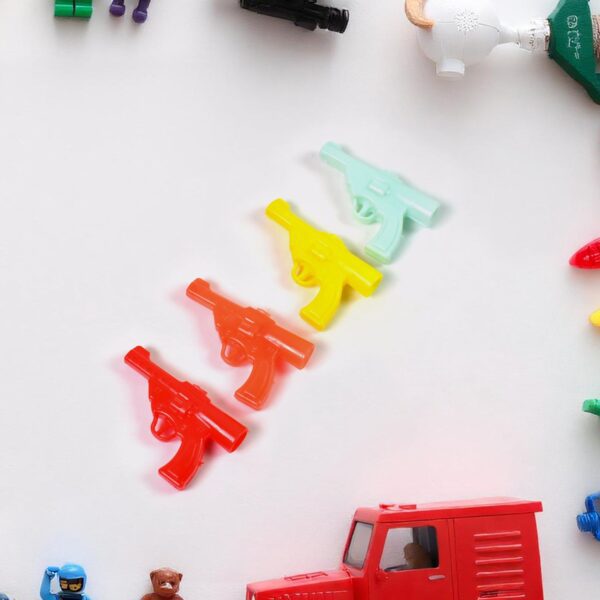 Gun Shape Pencil Top For Kids Office, Small Gun Toy (1 Pc / Mix Colour & Design) - Front View by Nari Haat, Indian et...