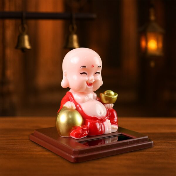 Solar Power Moving Head Buddha Statue Car Ornament (1 Pc / Mix Color) - Front View by Nari Haat, Indian ethnic wear, ...