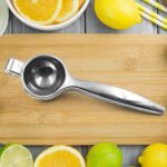 Premium Lemon Squeezer, Large Heavy Duty Handheld Juicer (1 Pc) - Front View by Nari Haat, Indian ethnic wear, women ...