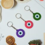 Evil Eye Rubber / Silicone Keychain (1 Pc / Mix Color) - Front View by Nari Haat, Indian ethnic wear, women clothing,...