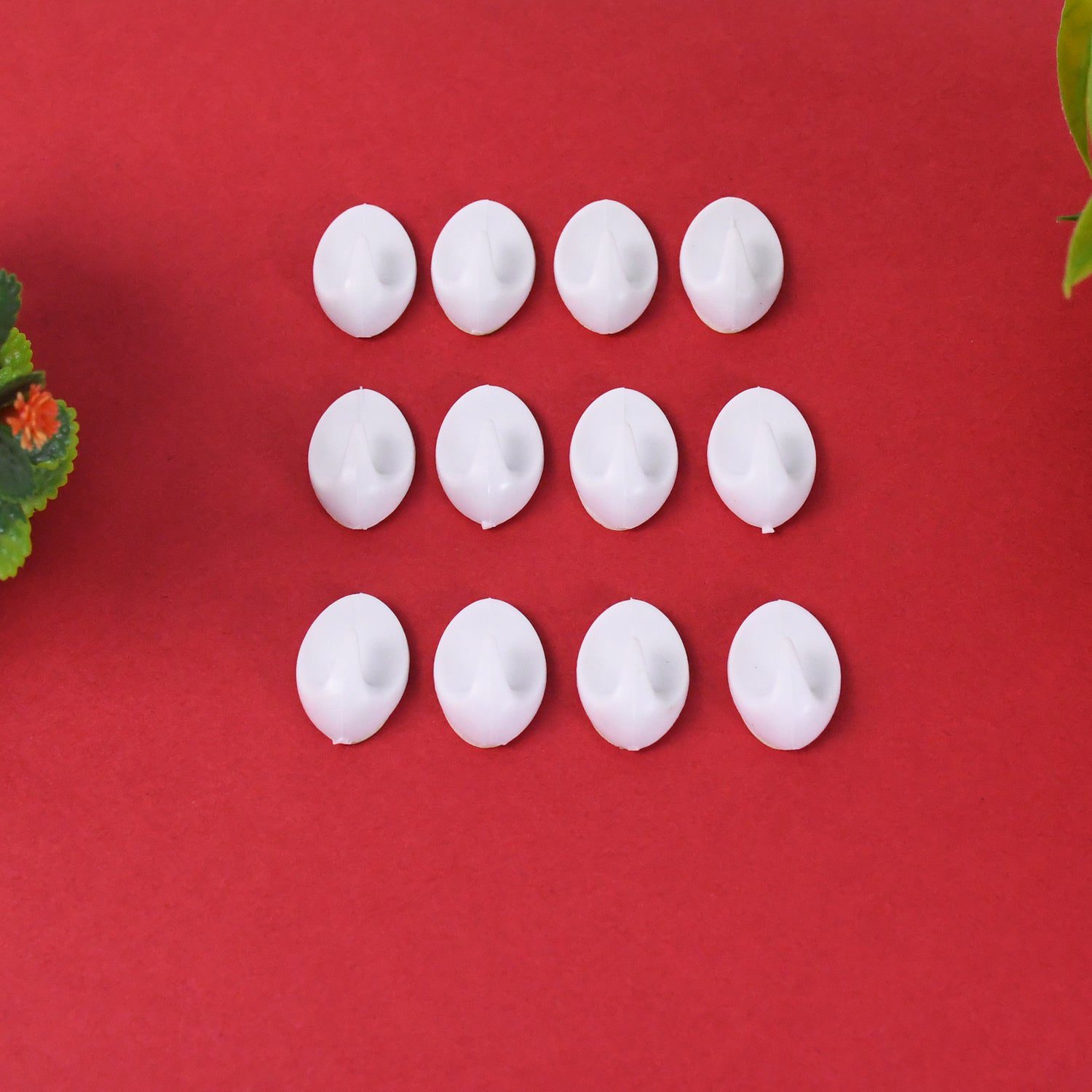 02_7a854705-f2e3-4255-8afd-3f1f79ad7f5a.jpg Earth Star Self Adhesive Plastic Wall Hook (12 Pc) - Front View by Nari Haat, Indian ethnic wear, women clothing, des...