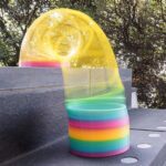 Rainbow Slinky Spring Toy – Compact Fun Toy for Kids & Adults, Gift-Friendly - Back View by Nari Haat, Indian ethni...