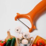 2 in 1 Kitchen Combo Lighter with Vegetable Cutter Peeler For Kitchen  (2 Pc Set) - Neckline Detail by Nari Haat, Ind...