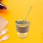 Glass coffee mug with straw and lid for home and travel