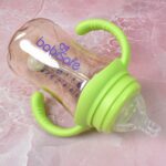 Plastic Baby Feeding Bottle with Handles, Cleaning brush & Straw (300 ML / 1 Pc) - Back View by Nari Haat, Indian eth...