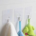 Self Adhesive Transparent Sticky Plastic & Stainless Steel Wall Hooks (10 Pcs Set) - Sleeve Design by Nari Haat, Indi...