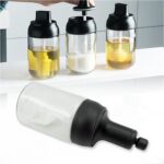 All-in-One Seasoning Jar: Heat-Resistant Glass with Spoon (1 Pc) - Front View by Nari Haat, Indian ethnic wear, women...