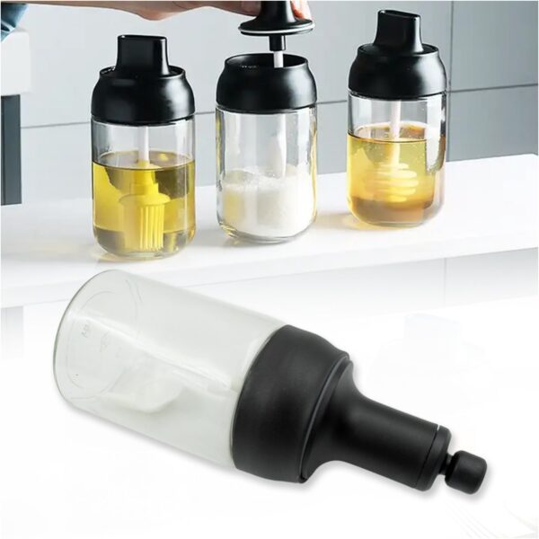 All-in-One Seasoning Jar: Heat-Resistant Glass with Spoon (1 Pc) - Front View by Nari Haat, Indian ethnic wear, women...