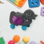 Small push back duck toy, Ejectable spring tail duck, Small DIY duck Toy - Back View by Nari Haat, Indian ethnic wear...