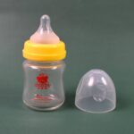 Glass Baby Feeding Bottle (120 ML / 1 Pc) - Closeup Embroidery by Nari Haat, Indian ethnic wear, women clothing, desi...