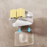 Magic Sticker Series Self Adhesive Mop and Broom Holder - Fabric Detail by Nari Haat, Indian ethnic wear, women cloth...