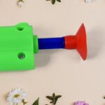 Medium Size Plastic 1 Gun with 5 Soft Suction Dart Bullets (1 Set) - Neckline Detail by Nari Haat, Indian ethnic wear...