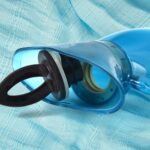 Transparent Personal Care Rubber Hot Water Heating Bag for Pain Relief (Small) - Neckline Detail by Nari Haat, Indian...