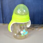 Plastic Baby Feeding Bottle with Handles Straw (300 ML / 1 Pc) - Back View by Nari Haat, Indian ethnic wear, women cl...