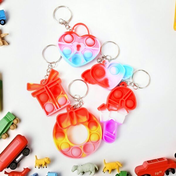 Compact Pop It Keychain – Fun Stress Relief Fidget Toy (1 Pc | Mix Design) - Front View by Nari Haat, Indian ethnic...