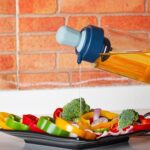 2 in 1 Transparent Oil Dispenser with Silicone Oil Dropper Nozzle (1 Pc / With Brush / 1 Ltr) - Neckline Detail by Na...