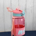 Plastic Water Bottle With Strap and Straw (1000 ML) - Back View by Nari Haat, Indian ethnic wear, women clothing, des...