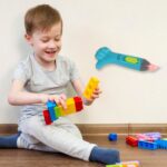 Thumb shaped light, lightning keychain, lightning toy, thumb shape LED light - Back View by Nari Haat, Indian ethnic ...