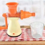 Apex Manual Carrot and Fruit Juicer – Heavy-Duty (1 Pc With Glass) - Front View by Nari Haat, Indian ethnic wear, w...
