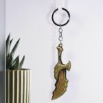 Metal God of War Keychain (1 Pc) - Front View by Nari Haat, Indian ethnic wear, women clothing, designer suit