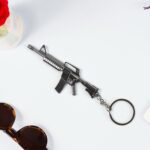 Mix Design Metal Gun Keychain With Case (1 Pc / Mix Design) - Sleeve Design by Nari Haat, Indian ethnic wear, women c...