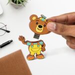 Portable Cartoon Silicone USB Pen Drive (15 GB Baby Rhymes Song / 1 Pc) - Closeup Embroidery by Nari Haat, Indian eth...