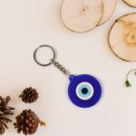 Evil Eye Rubber / Silicone Keychain (1 Pc / Blue Color) - Back View by Nari Haat, Indian ethnic wear, women clothing,...
