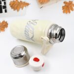 Stainless Steel Vacuum Insulated Water Bottle – Leak Proof Flask with Steel Cup - Sleeve Design by Nari Haat, India...