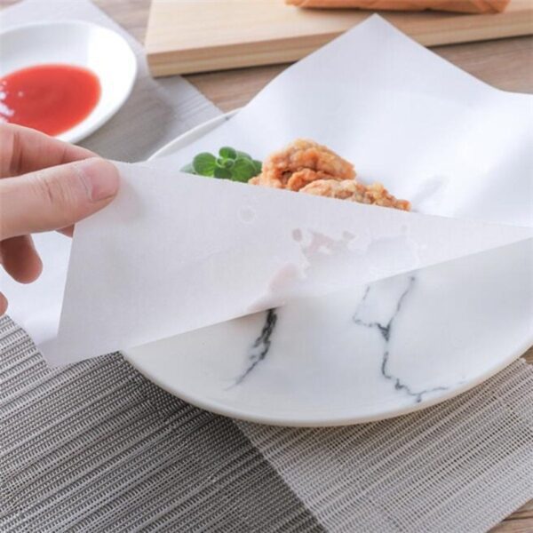 Oil absorbing cooking paper sheets