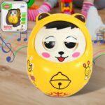 Musical roly poly wobbling doll for babies