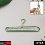 Plastic Hanging Hook - Multi-Hole Wardrobe Organizer for Clothes Storage & Display - With Dupatta by Nari Haat, India...