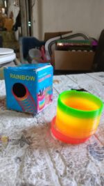 Rainbow Slinky Spring Toy – Compact Fun Toy for Kids & Adults, Gift-Friendly - Full Detail by Nari Haat, Indian eth...