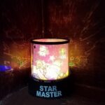 LED Projector Night Light with Rotating Music Ideal for Kids Home Decor - Front View by Nari Haat, Indian ethnic wear...