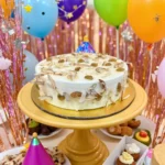 Milk Bar Cake Creamy White Frosting with Slivered Almonds & Golden Raisins (1)