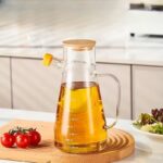 Premium High Borosilicate Glass Oil Bottle 900ml with Scale | Leakproof Bamboo Lid & Dustproof Spout | Heat-Resistant...