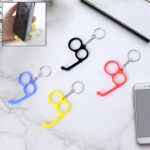 2-in-1 Plastic Dual-Finger Mobile Stand cum Keyring  (1 Pc, Mixed Color) - Front View by Nari Haat, Indian ethnic wea...