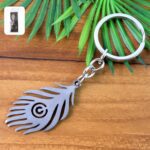 Stylish Stainless Steel Peacock Feather Keychain (1 Pc) - Front View by Nari Haat, Indian ethnic wear, women clothing...