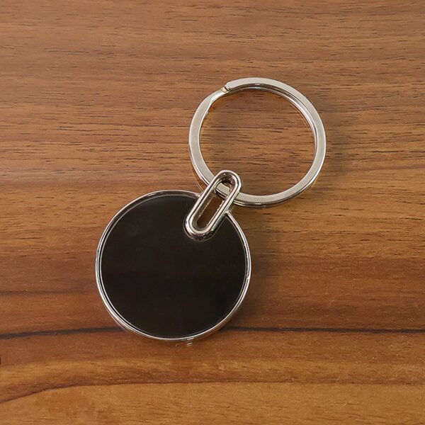 Sleek Black Round Metal Keychain (1 Pc) - Front View by Nari Haat, Indian ethnic wear, women clothing, designer suit