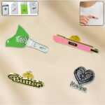 Stylish Metal Badge Pin – Single Piece (Random Design) - Front View by Nari Haat, Indian ethnic wear, women clothin...