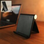 Plastic Foldable Desktop Mobile Stand (1 Pc / Black) - Front View by Nari Haat, Indian ethnic wear, women clothing, d...