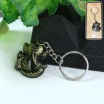 Ganesh Face Antique Black Metal Keychain (1 Pc) - Front View by Nari Haat, Indian ethnic wear, women clothing, design...