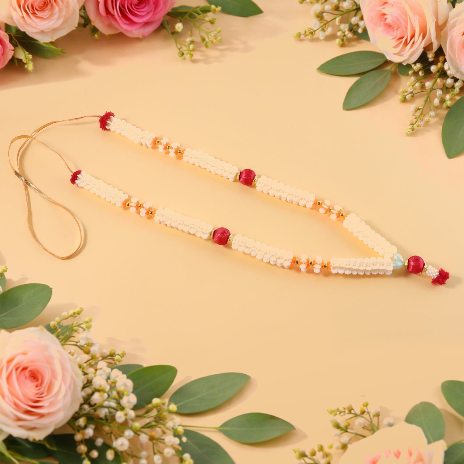 01_81af5799-7524-46bb-8764-0f19f7fbde18.jpg Traditional Decorative Pooja Gajra Garland (1 Pc) - Front View by Nari Haat, Indian ethnic wear, women clothing, desi...