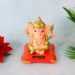 Decorative Medium Lord Ganesh Idol Decorative Statue with Solar-Powered Base (1 Pc) - Front View by Nari Haat, Indian...
