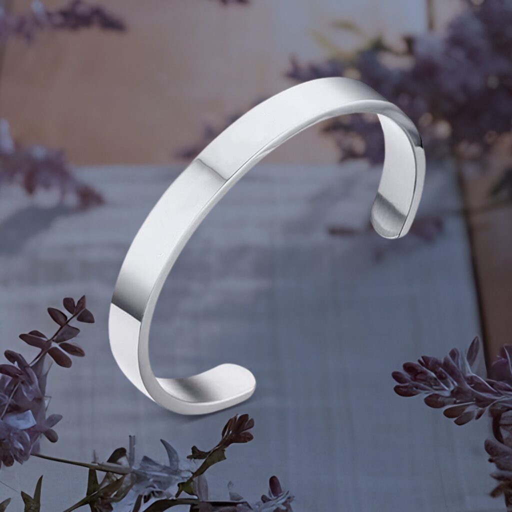 Minimalist Polished Open-Ended Silver-Tone Stainless Steel Kada (1 Pc) - Front View by Nari Haat, Indian ethnic wear,...