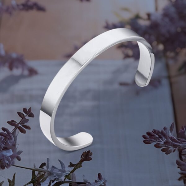 Minimalist Polished Open-Ended Silver-Tone Stainless Steel Kada (1 Pc) - Front View by Nari Haat, Indian ethnic wear,...