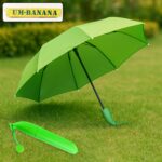 Green Stylish Banana Shaped Mini Foldable Umbrella - Front View by Nari Haat, Indian ethnic wear, women clothing, des...