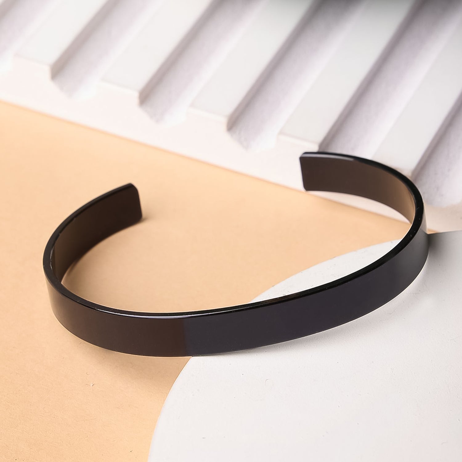 01_ad28d353-164c-48d9-95c6-aeef2ab8c0af.jpg Stylish Black-Plated Stainless-Steel kada (1 Pc) - Front View by Nari Haat, Indian ethnic wear, women clothing, desig...