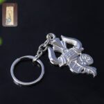 Trishul Damru Shiv Symbol Silver Keychain (1 Pc) - Front View by Nari Haat, Indian ethnic wear, women clothing, desig...